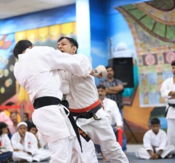A person trains against an adversary